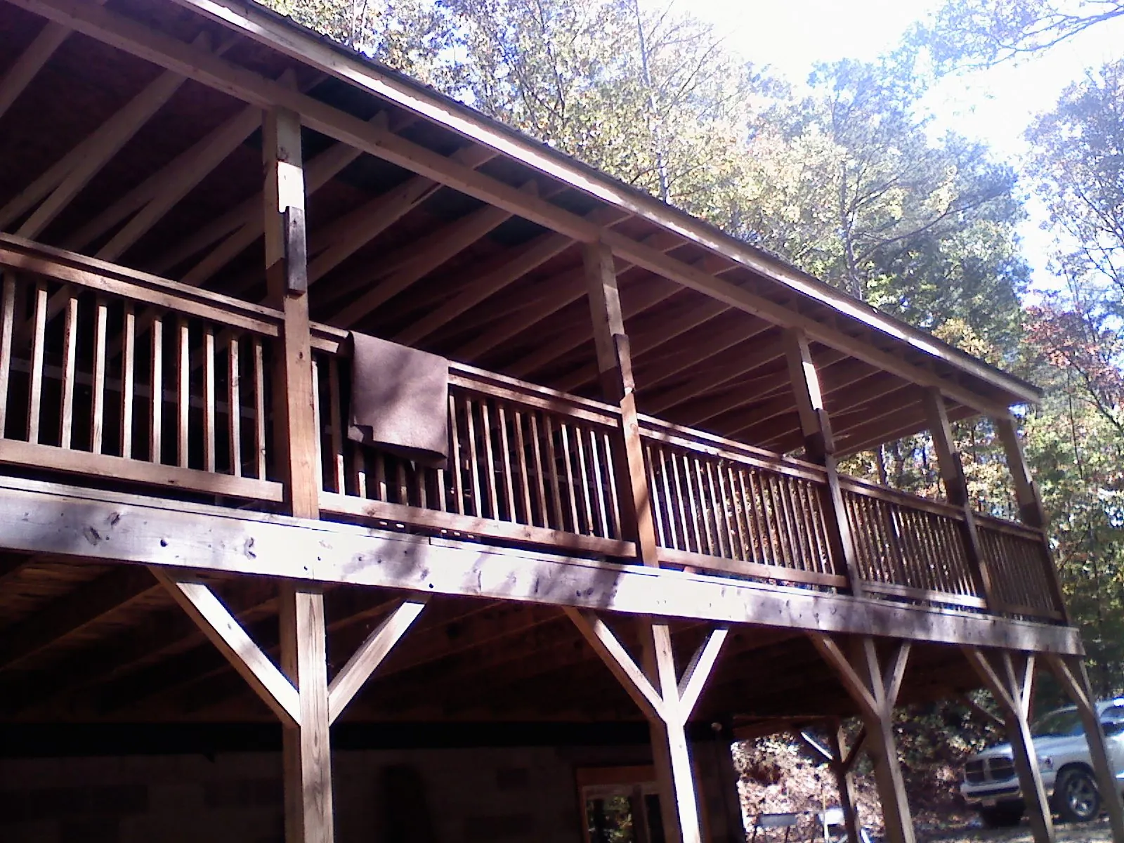 Timber framing under a new elevated porch and deck — Roof Leak Repair in Cheshire by Roofing Brothers